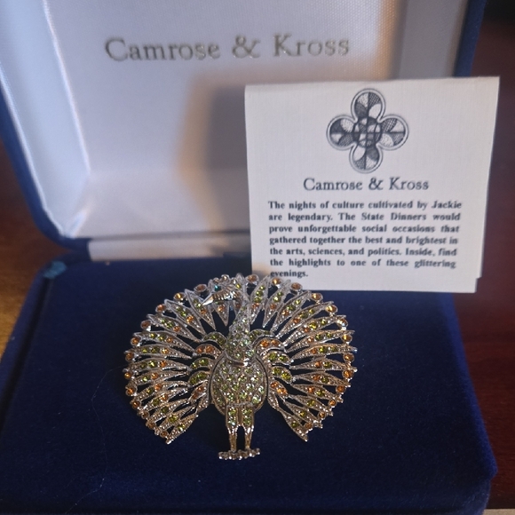 Silver Peacock Brooch with Green and Orange Accents